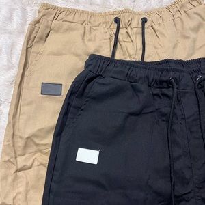 Two pack of mens drawstring shorts, never worn.